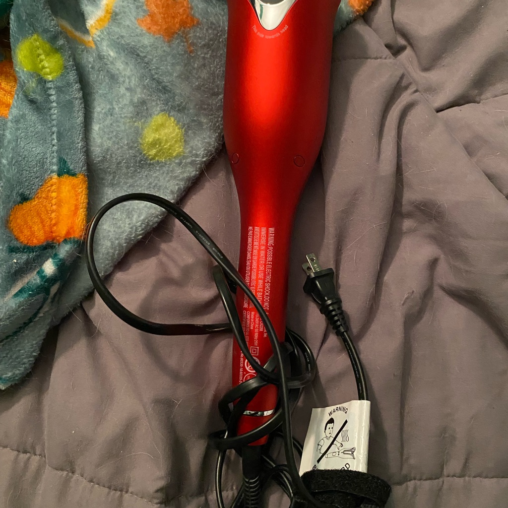Red Handheld Hair Styling Tool Red Handheld Hair Styling Tool